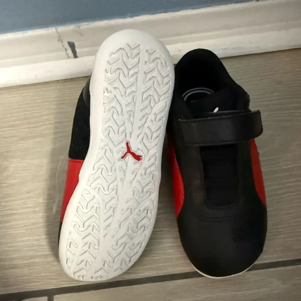 Brand new Puma Kids Black and Red Sneakers